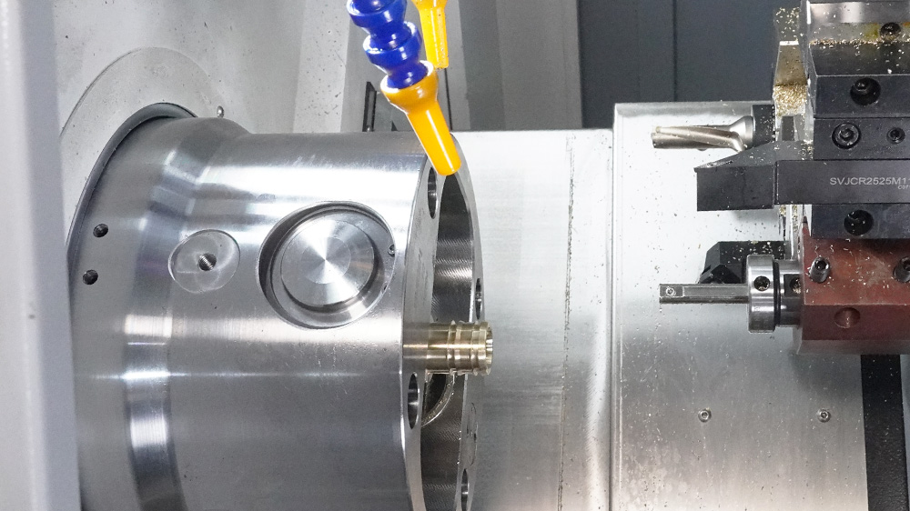 Turret CNC lathe in operation, showing multi-station tool turret and workpiece Turret CNC lathe in operation, showing multi-station tool turret and workpiece